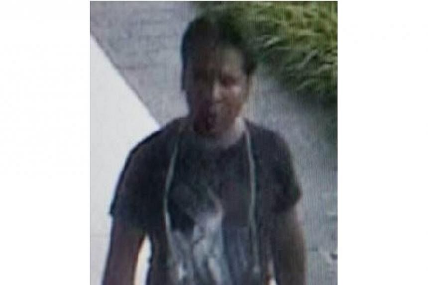 Police are looking for this man, last seen wearing a dark-coloured shirt and a pair of coloured jeans, to assist with investigations into a case of outrage of modesty. -- PHOTO: SINGAPORE POLICE FORCE&nbsp;