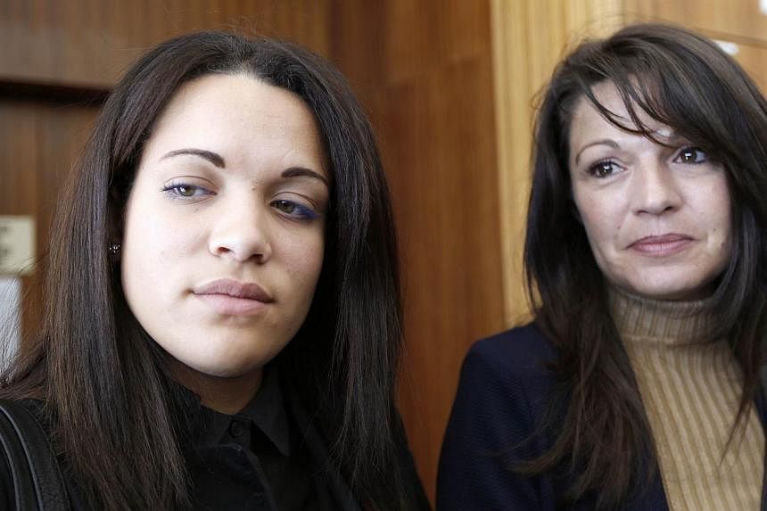 Manon Serrano (left) and her mother Sophie Serrano (right) answer journalists' questions, on Dec 1, 2014 at Grasse courthouse, after a hearing regarding the 12 millions euro compensation the Serrano family along with another family requested against 
