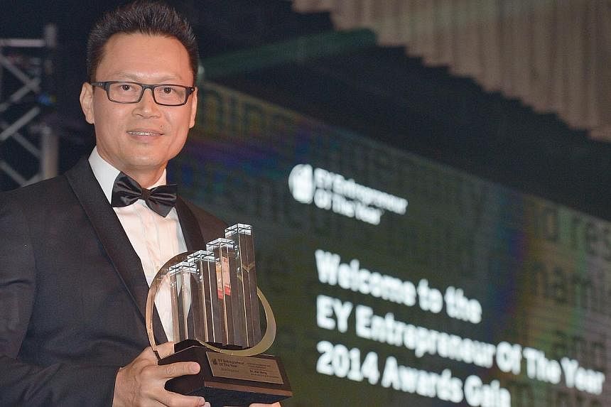 Dr Kar Wong, group managing director of Advanced Group of Companies, was named the overall winner of the EY Entrepreneur of the Year at an awards gala dinner at the Ritz Carlton this evening. -- ST PHOTO:&nbsp;DESMOND WEE