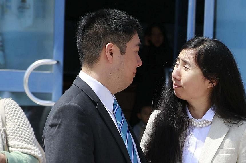 A Qatari appeals court overturned the convictions of Matthew and Grace Huang on Sunday over the death of their eight-year-old daughter Gloria after finding that a lower court had made errors in the high-profile case. But the US couple's passports wer