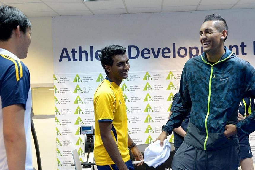 Australian tennis player Nick Kyrgios met students from the Australian International School (AIS) on Tuesday, sharing stories from his journey so far with some of the school's top athletes. -- ST PHOTO: JAMIE KOH&nbsp;