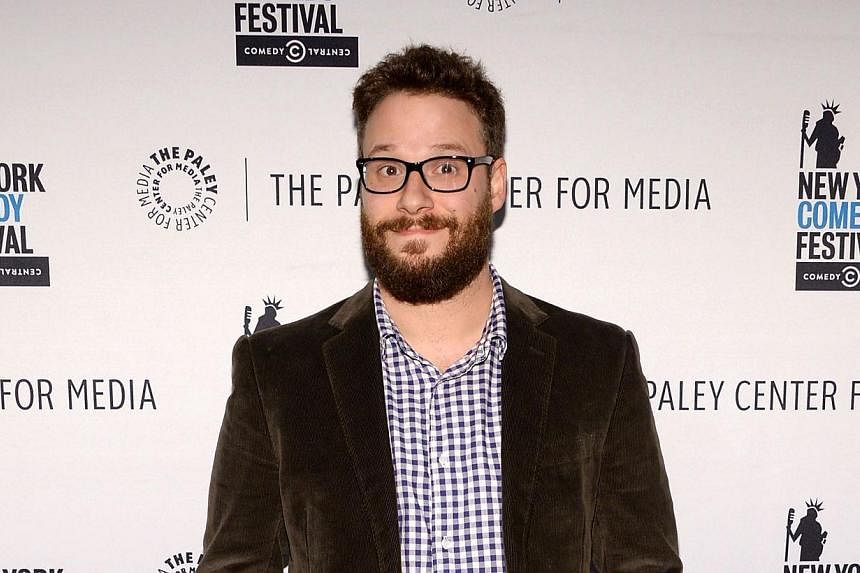 Actor Seth Rogen attends a panel discussion in New York City on Nov 9. Rogen stars in a satire called The Interview, about a plot to kill North Korean leader Kim Jong Un, to be released by Sony Pictures which has seen several of its movies hacked and