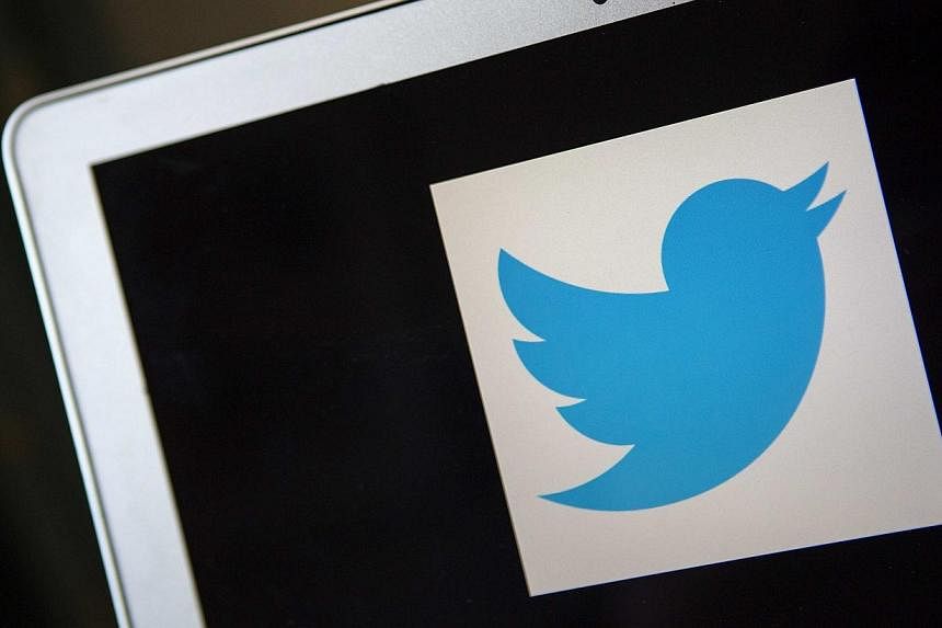 Twitter is boosting safeguards to prevent its network being used for harassment and abuse, it said on Tuesday. -- PHOTO: REUTERS