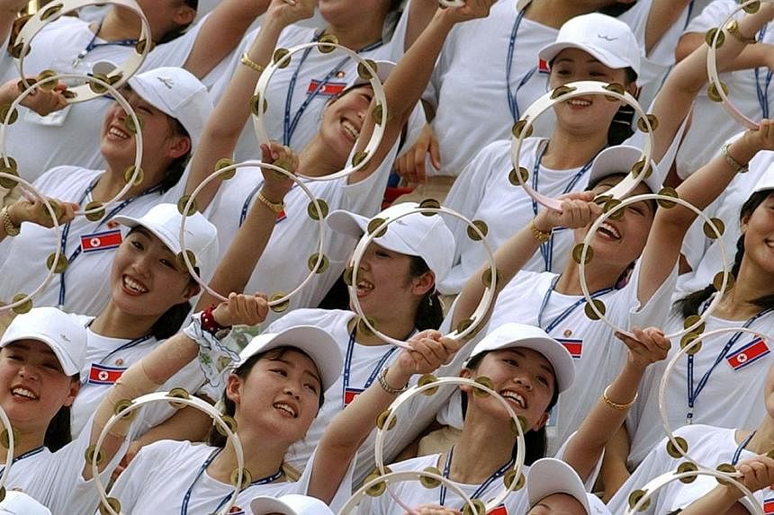 The security chief of the Chinese boom town of Shenzhen allegedly funnelled construction projects for the 2011 World Student Games worth hundreds of millions of dollars through his family, state-run media reported on Wednesday. -- PHOTO: AFP