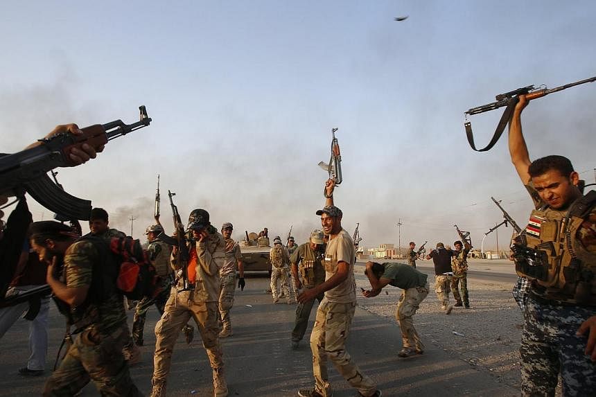 The tide is beginning to turn on the Islamic State in Iraq and Syria (ISIS) group, analysts say, with the extremists losing ground in Iraq and only able to hold on to their positions in Syria. -- PHOTO: REUTERS