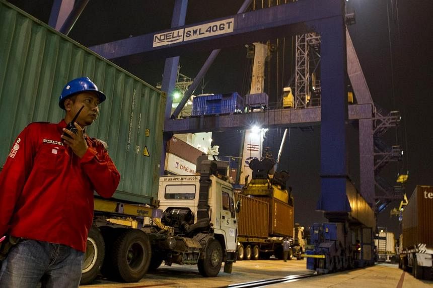 Containers being loaded onto a ship at the Tanjung Priok port district in Jakarta. For Indonesia, the Philippines and Vietnam, investing in infrastructure will be critical to maintaining an edge in the future. Meanwhile, competitiveness in Myanmar, L