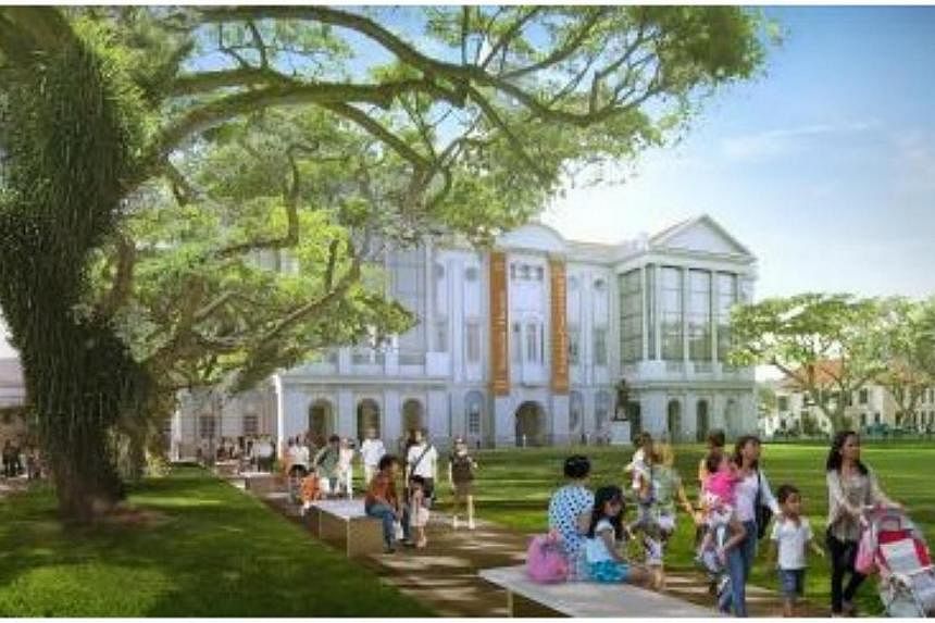 Works to realign part of Fullerton Road to create a more spacious lawn in front of the Asian Civilisations Museum and the Victoria Theatre and Concert Hall will be completed by July 2015. -- PHOTO: URA