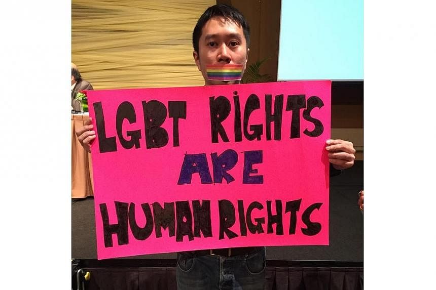 Civil society activists staged a colourful silent protest on Thursday during law professor and former Nominated Member of Parliament Thio Li-ann’s speech at a human rights seminar. -- PHOTO: KIRSTEN HAN