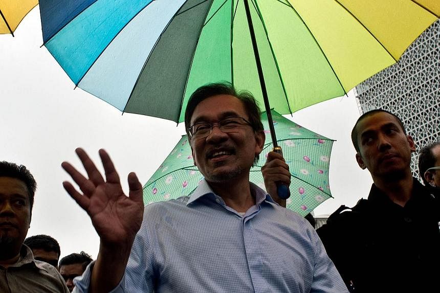 The Selangor Palace said in a statement on Thursday that the decision to revoke Anwar Ibrahim's (above) title was because he had "repeatedly questioned the integrity of Selangor Sultan Sharafuddin Idris Shah and the royal institution in the recent Me