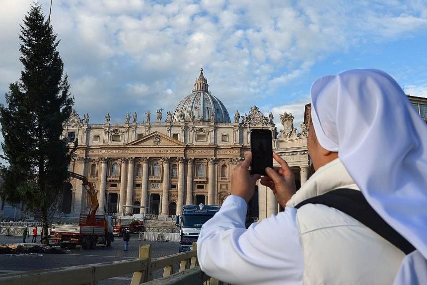 The Vatican's economy minister has said hundreds of millions of euros were found "tucked away" in accounts of various Holy See departments without having appeared in the city-state's balance sheets. -- PHOTO: AFP