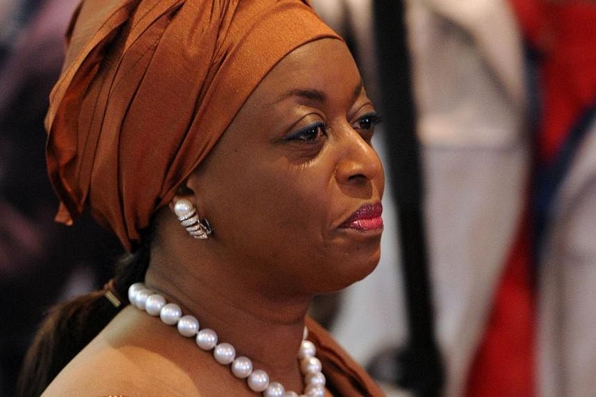 Opec is facing a challenging time due to the fall in oil prices and many members and non-members are "suffering immensely", the cartel's president and Nigeria's oil minister, Diezani Alison-Madueke (above), said Wednesday. -- PHOTO: AFP