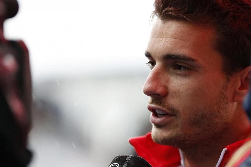 French Formula One driver Jules Bianchi (above) did not slow sufficiently under warning flags before crashing at the Japanese Grand Prix, an International Automobile Federation report found on Wednesday. -- PHOTO: REUTERS