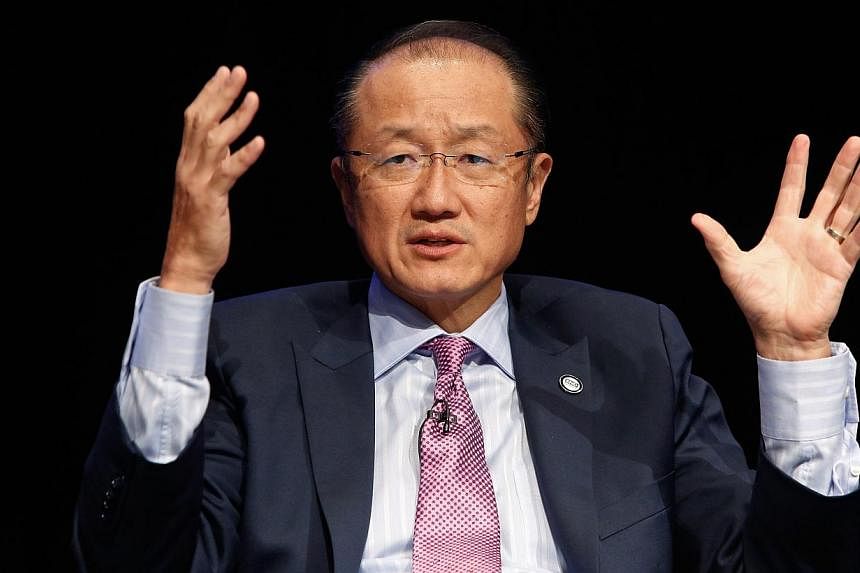World Bank chief Jim Yong Kim (above) announced a US$160 million (S$209 million) two-year economic recovery plan on Wednesday to help impoverished Sierra Leone battle the worst Ebola outbreak on record. -- PHOTO: REUTERS
