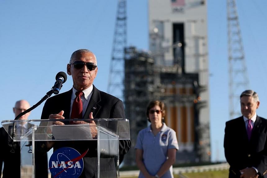 Nasa administrator Charlie Bolden&nbsp;speaks to the media near the United Launch Alliance Delta 4 rocket carrying Nasa's first Orion deep space exploration craft as it sits on its launch pad on Dec 3, 2014 in Cape Canaveral, Florida. -- PHOTO: AFP