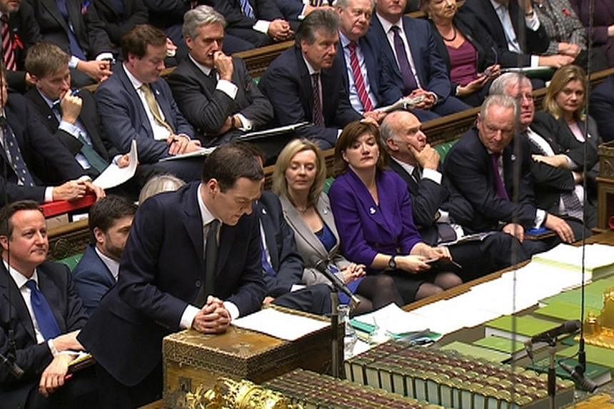 A still image from video shows Britain's Chancellor of the Exchequer George Osborne delivering the Autumn Statement to Parliament in London Dec 3, 2014.&nbsp;The British government on Wednesday slapped a new tax rate on multinational companies that s