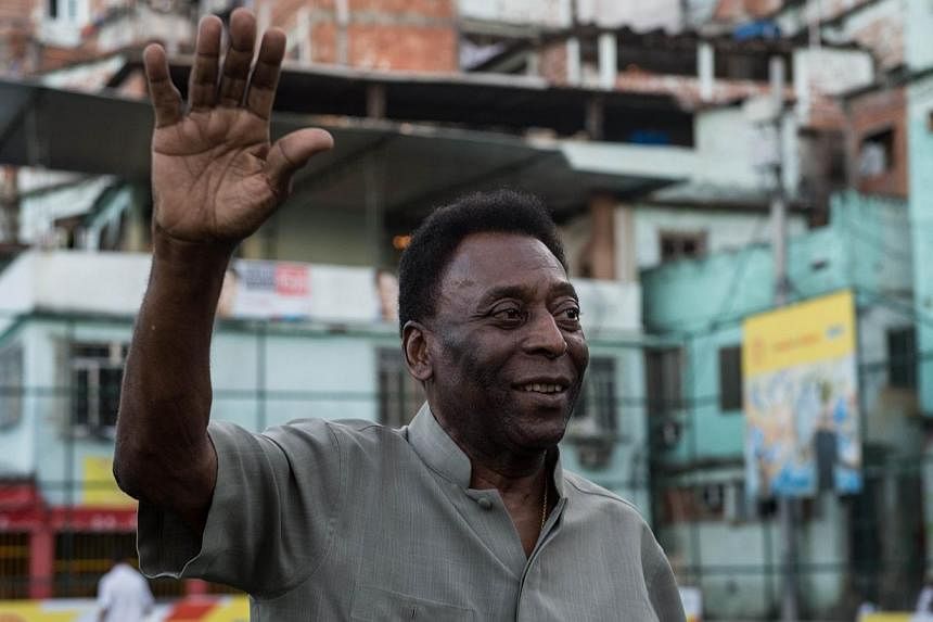 Brazilian soccer legend Pele (above) is recovering well from a kidney ailment, officials said Wednesday, but it is unclear when he can leave the Sao Paulo hospital treating him. -- PHOTO: AFP