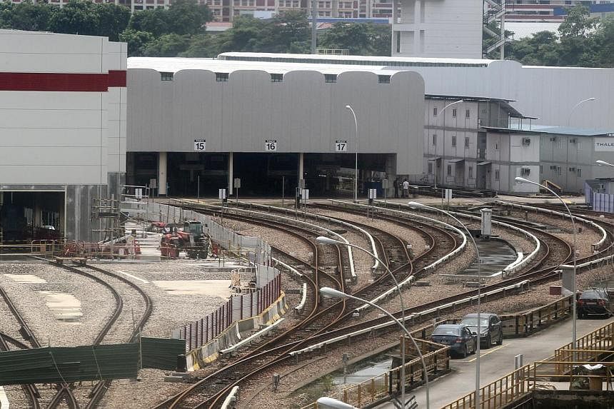 SMRT said it is working with authorities to address security vulnerabilities found at its Bishan depot, following a breach last month which resulted in a train being vandalised allegedly by two German nationals. -- PHOTO: SHIN MIN&nbsp;