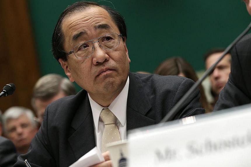 Hiroshi Shimizu, Takata's senior vice-president of global quality assurance, testifies at a Congressional hearing on Dec 3, 2014 in Washington, DC. Shimizu&nbsp;on Wednesday defended the Japanese company's rejection of a nationwide US recall of its p