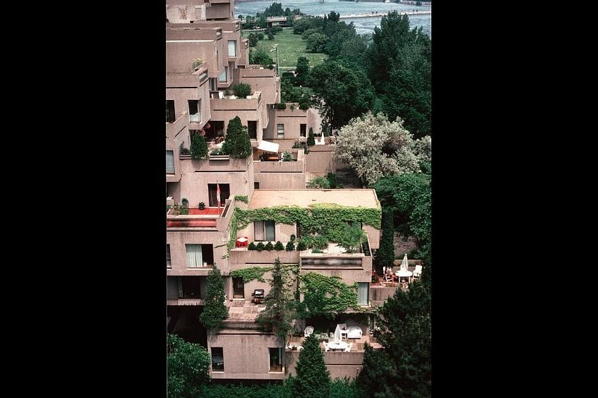 Habitat 67 in Montreal, Canada was designed by Moshe Safdie between 1964 and 1967. Box-like concrete residential units stacked in a seemingly random way to create interspersed crannies which inhabitants can use as calming, private nooks. -- PHOTO: MO