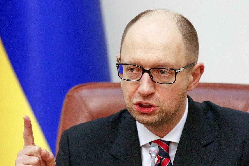&nbsp;Ukraine's Prime Minister Arseny Yatseniuk speaks during a government meeting in Kiev on Dec 3, 2014.&nbsp;An International Monetary Fund mission will visit Kiev from December 9 to 18 for talks with the new government regarding a $17 billion bai
