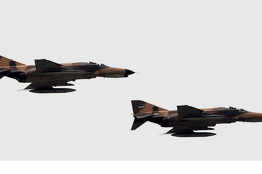 F-4 Phantom fighter jets flying during the Army Day parade in the Iranian capital Tehran on April 18, 2010.&nbsp;A senior Iranian official has confirmed his country carried out air strikes in neighbouring Iraq against the Islamic State in Iraq and Sy
