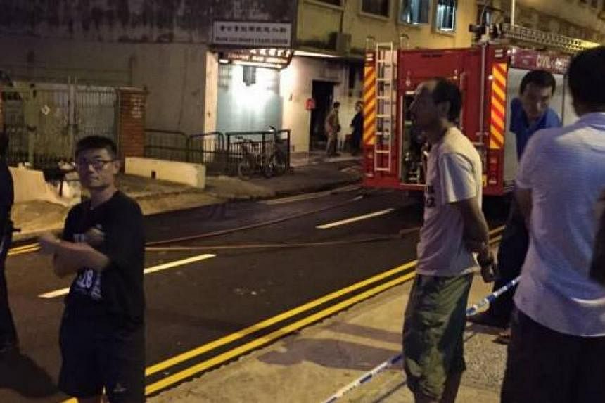 Three people were killed after a fire broke out early this morning at a workers' shophouse&nbsp;in Geylang Lorong 4. --&nbsp;PHOTO: THE NEW PAPER