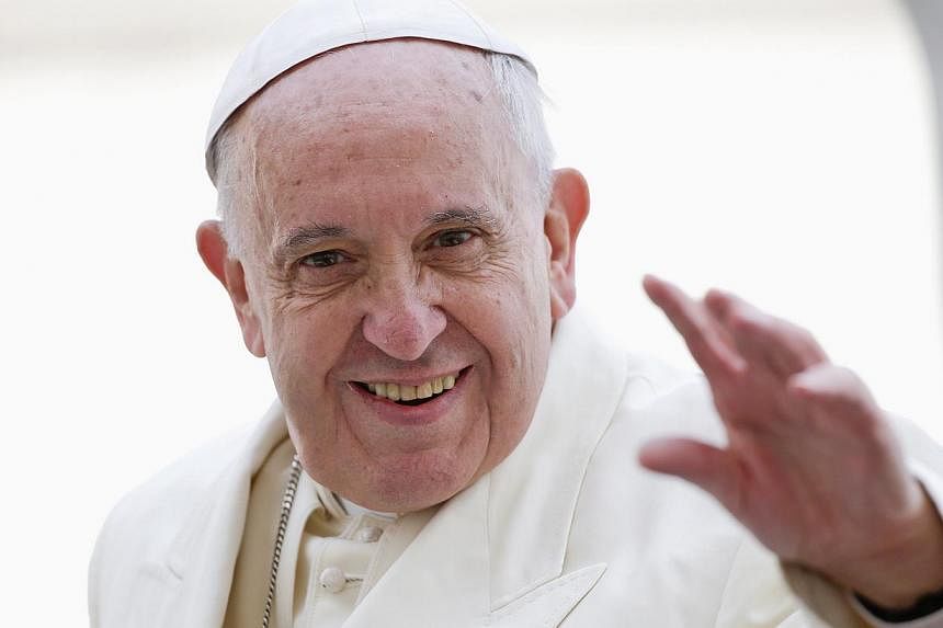 A biographical film on Pope Francis' (above) childhood and life as a cardinal and archbishop before becoming pontiff will be shot next year in his native Argentina, producers said Friday. -- PHOTO: REUTERS