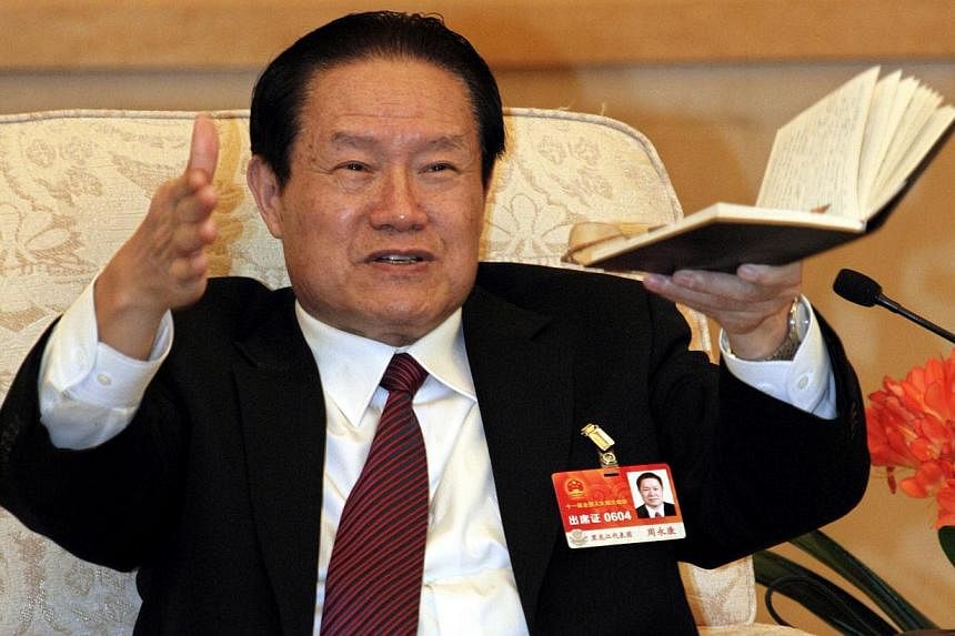 Former top Communist Zhou Yongkang (above) rose through China's state oil industry to become the country's internal security chief - and amassed so much power, according to analysts, that he brought about his own downfall. -- PHOTO: REUTERS