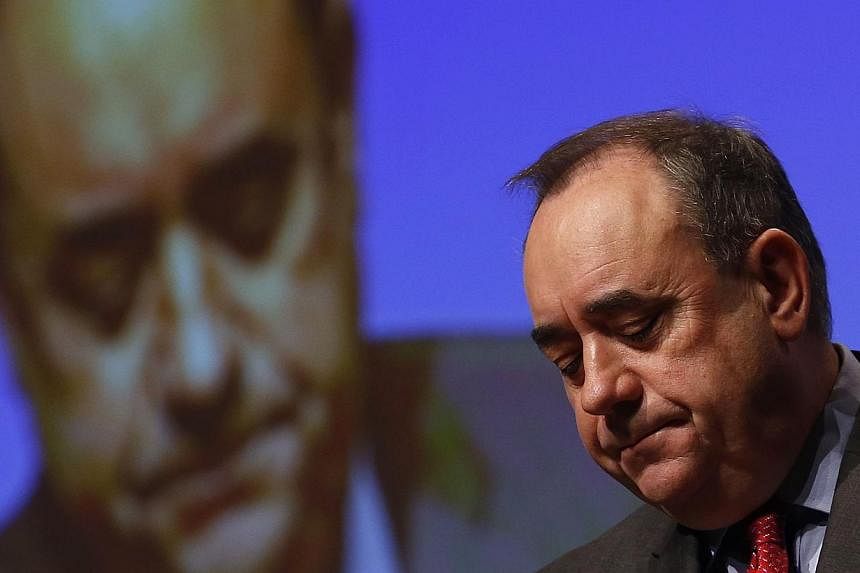 Scotland's First Minister; and now former leader of the Scottish National Party; Alex Salmond, reacts during his speech at the SNP's annual conference in Perth, Scotland, on Nov 14, 2014.&nbsp;Mr Salmond said on Sunday, Dec 7, that he would run for a