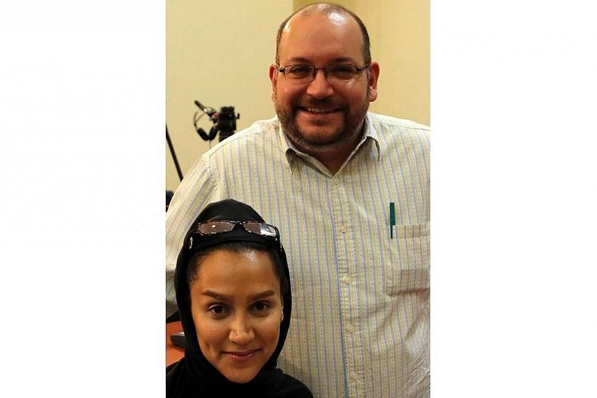 A file picture taken on Sept 10, 2013 shows Iranian-American Washington Post correspondent Jason Rezaian and his Iranian wife Yeganeh Salehi.&nbsp;United States Secretary of State John Kerry said on Sunday he was "deeply disappointed" by reports that