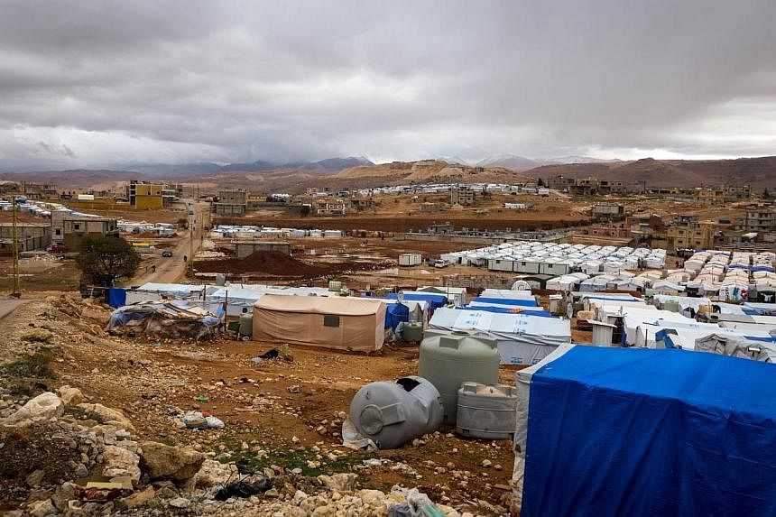 A file picture taken on Oct 23, 2014, shows the Al-Nihaya Syrian refugee camp in the Lebanese town of Arsal.&nbsp;Lebanese gunmen opened fire on and burned Syrian refugee tents in north Lebanon, wounding two refugees, security sources said on Sunday,