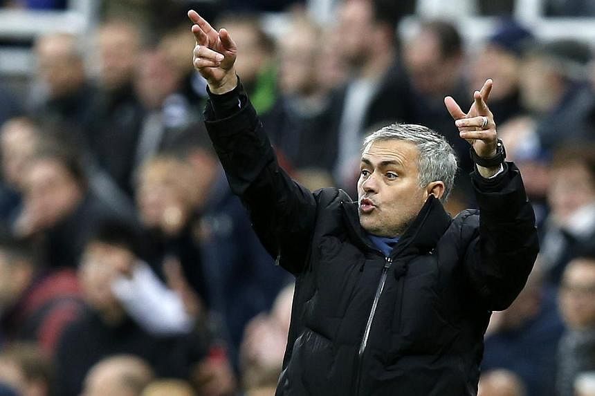 Chelsea manager Jose Mourinho gestures during their English Premier League soccer match against Newcastle United at St James' Park in Newcastle, northern England Dec 6, 2014. Mourinho accused the St James' Park ball boys of taking too long to return 