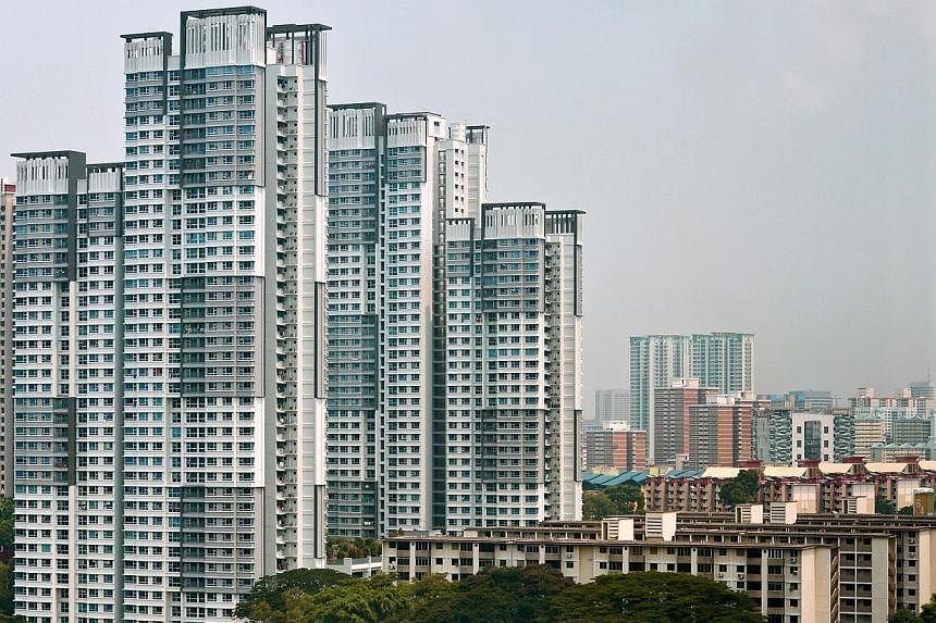 HDB blocks in Tanglin Halt. Owners residing in Housing Board flats will enjoy a reduction in their property tax in 2015 compared to this year, said the Inland Revenue Authority of Singapore on Monday. -- ST PHOTO: CAROLINE CHIA