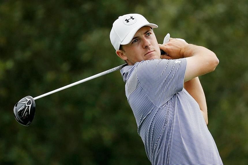 Jordan Spieth hits his tee shot on the 14th hole during the final round of the Hero World Challenge at the Isleworth Golf &amp; Country Club in Windermere, Florida on Dec 7, 2014. -- PHOTO: AFP