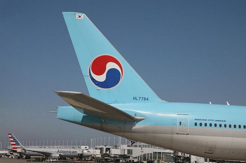 The daughter of the CEO of Korean Air forced the chief flight attendant off a New York-bound plane after she was incorrectly served some nuts - delaying the flight and triggering a government probe, officals said on Monday, Dec 8, 2014. -- PHOTO: AFP