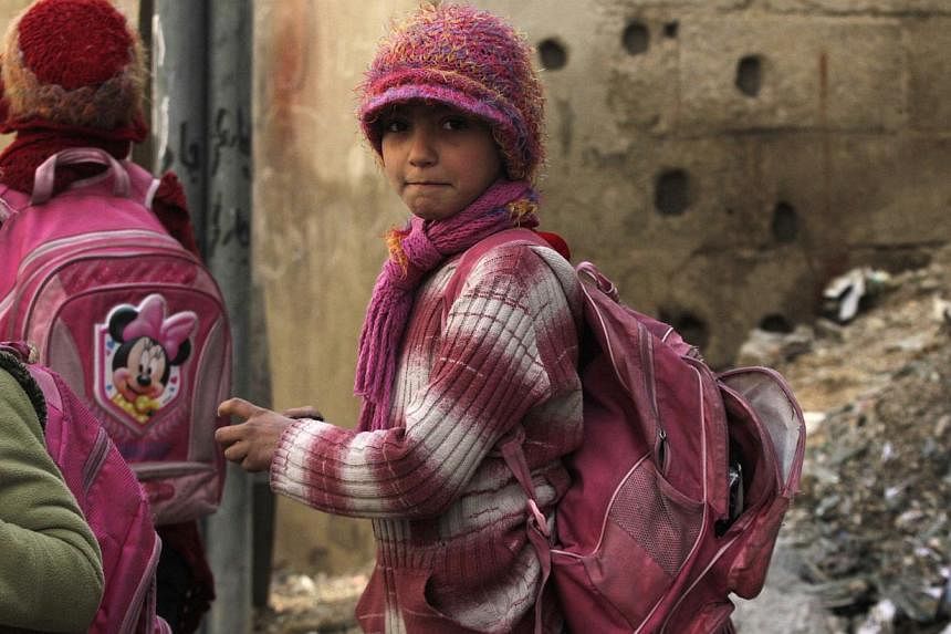 Children in Damascus on Dec 2, 2014. -- PHOTO: REUTERS