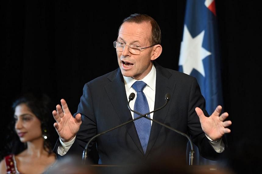 A poll in Fairfax Media showed Abbott's personal approval rating is down to 38 per cent from the last survey five weeks ago, while Labor opposition leader Bill Shorten has jumped to 46 per cent. They were previously level-pegging. -- PHOTO: AFP&nbsp;