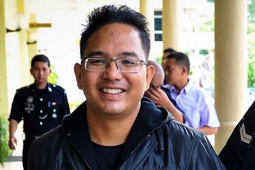 Malaysian activist Ali Abd Jalil, who had his passport revoked by the Immigration Department on Monday, claims he has been issued an asylum identity card by the Swedish government. -- PHOTO: THE STAR/ASIA NEWS NETWORK