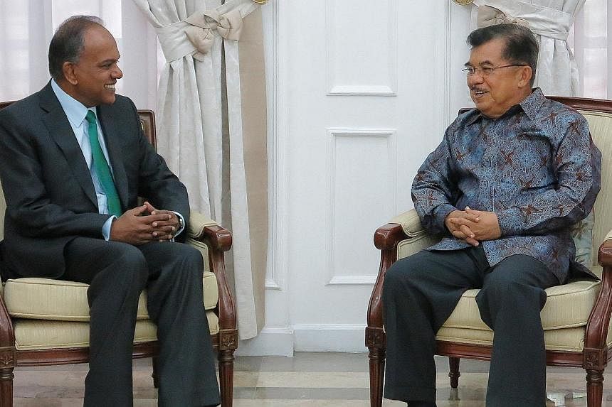 Minister for Foreign Affairs and Law K Shanmugam (left) pays a courtesy call on Indonesian Vice President Jusuf Kalla in Jakarta, Indonesia. -- PHOTO: MINISTRY OF FOREIGN AFFAIRS&nbsp;