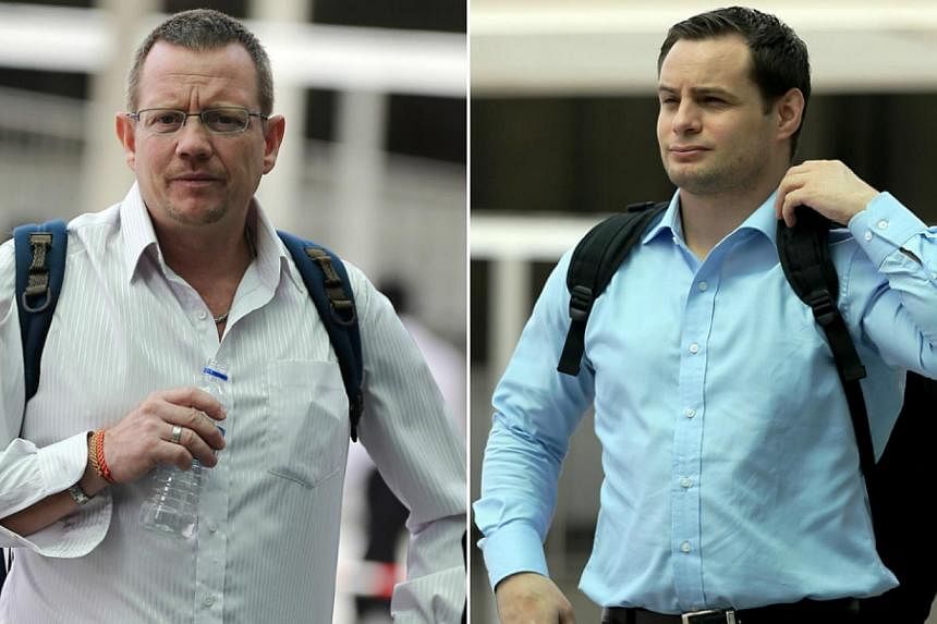Three foreign nationals, including Arne Corneliussen (left) and Andreas Michel Blomqvist, were hauled to court on Tuesday over offences involving taxi drivers. -- ST PHOTOS: WONG KWAI CHOW