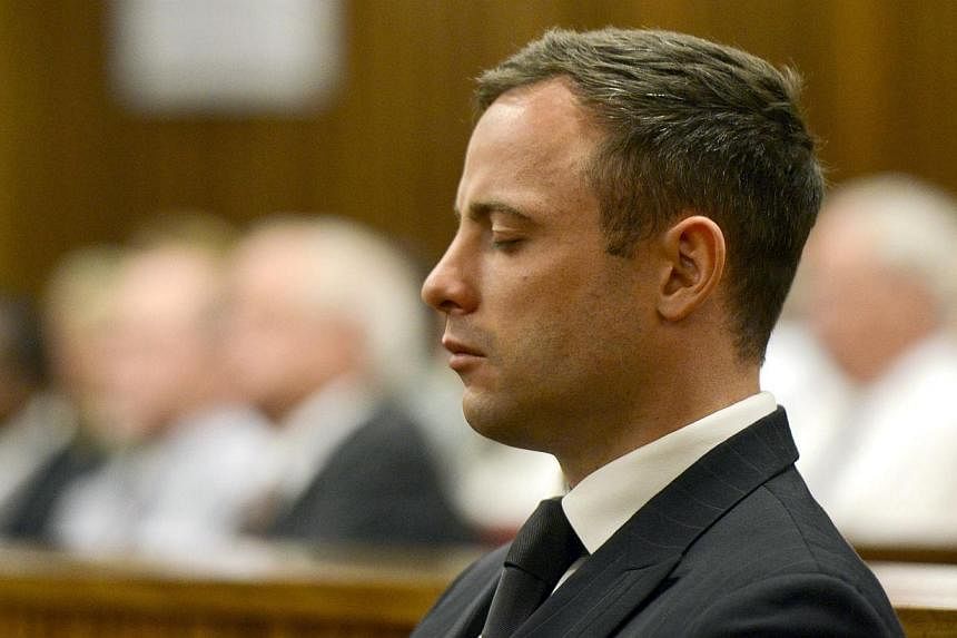 Paralympian Oscar Pistorius is seen during his sentencing for the killing of his girlfriend Reeva Steenkamp at the high court in Pretoria, on Oct 21, 2014.&nbsp;A South African judge on Tuesday delayed ruling on whether to allow an appeal against Osc