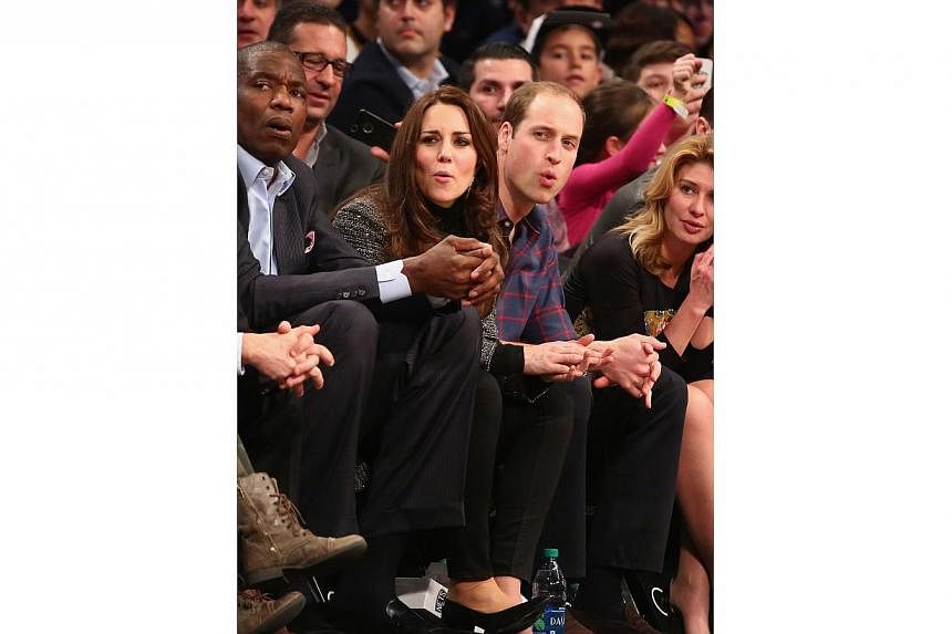 Prince William, Duke of Cambridge and Catherine, Duchess of Cambridge watch the game between the Cleveland Cavaliers and the Brooklyn Nets at Barclays Center on Dec 8, 2014 in the Brooklyn borough of New York City. -- PHOTO: AFP