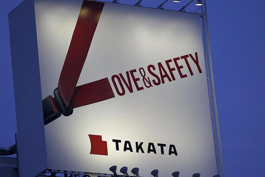 A Tokyo billboard advertisement for Takata Corp in September. -- PHOTO: REUTERS
