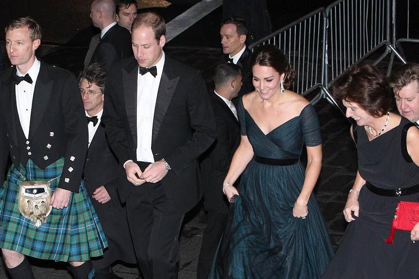 Prince William, Duke of Cambridge and Catherine, Duchess of Cambridge, arrive at the Metropolitan Museum of Art to attend the St Andrews 600th Anniversary Dinner on Dec 9, 2014, in New York City. -- PHOTO: AFP&nbsp;