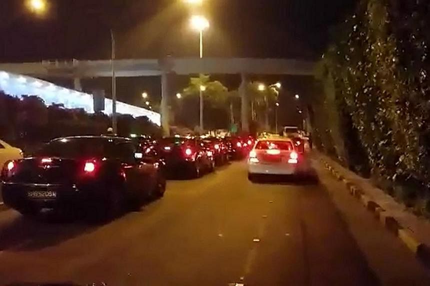 Drivers of premium cabs blared their horns continuously in the early hours of yesterday to show their unhappiness with the new segregated queue system on trial at Changi Airport's Terminal 1. Some said as many as 400 cabs had participated in the prot