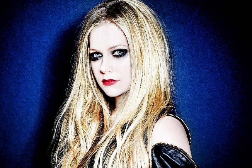 Singer Avril Lavigne is suffering from undisclosed health issues, according to a Twitter exchange between her and a fan. -- PHOTO: SONY MUSIC SINGAPORE