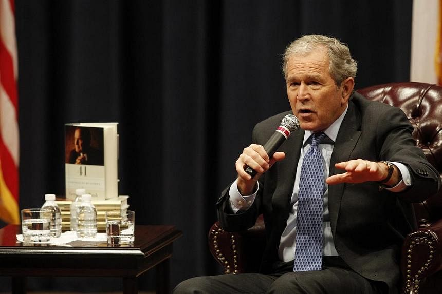 Former US President George W. Bush speaks at the George Bush Presidential Library Centre in College Station, Texas, on Nov 11, 2014. Mr Bush was only given details of the torture being used by the Central Intelligence Agency four years into the bruta