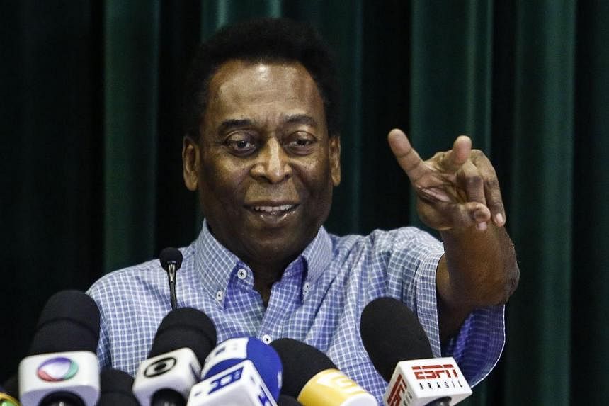 Brazilian football legend Edson Arantes do Nascimento, known as Pele, offers a press conference after being released from hospital in Sao Paulo, Brazil, on Dec 9, 2014. Pele has recovered well from his kidney ailment and left hospital on Tuesday, aft