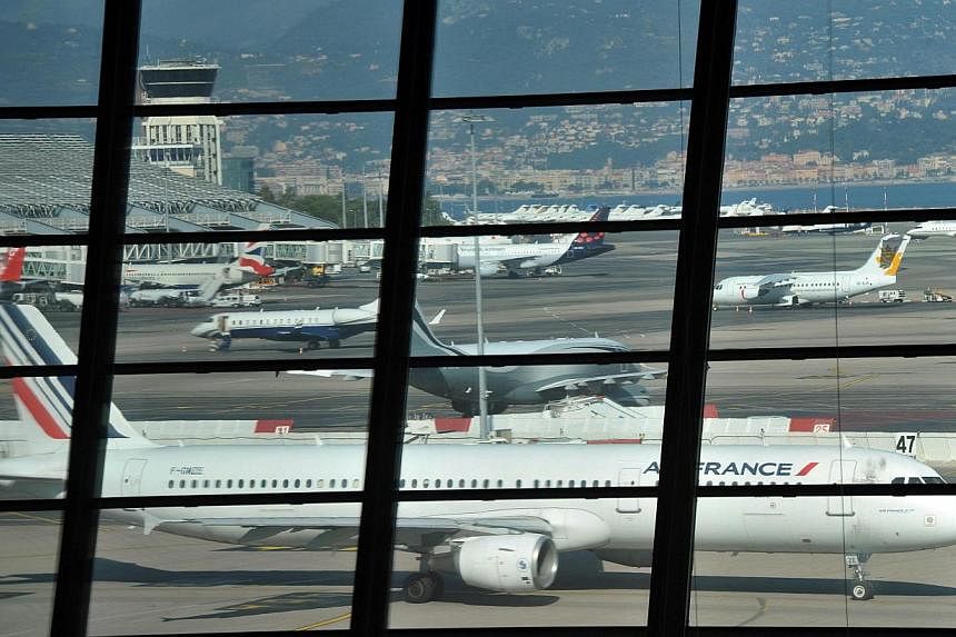 Planes on the tarmac at Nice international airport on Sept&nbsp;27, 2014.&nbsp;&nbsp;The European Union is weighing up plans to impose flight-tracking unilaterally in response to the disappearance of a Malaysian jetliner, threatening a backlash from 