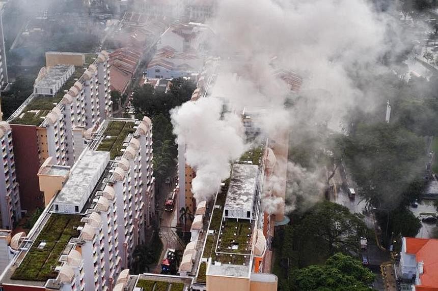 A fire broke out on the 12th floor of Block 2 in Everton Park on Dec 11, 2014. -- PHOTO:&nbsp;GERALD TEW CHONG HWEE